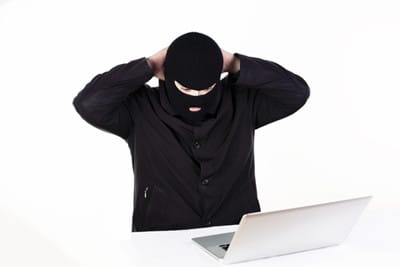 image hacker caught at laptop