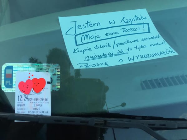 Stranger buys parking ticket for illegally parked car left by Polish couple having baby