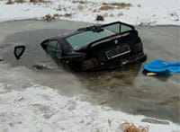 Polish drivers escape death as their cars break through the ice, in two separate incidents