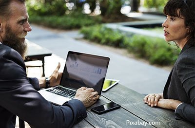 woman and man working